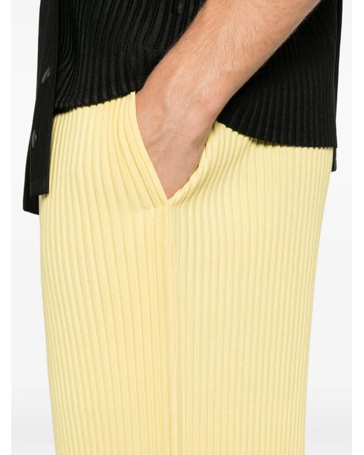 Homme Plissé Issey Miyake Yellow Tailored Pleats Cropped Trousers for men
