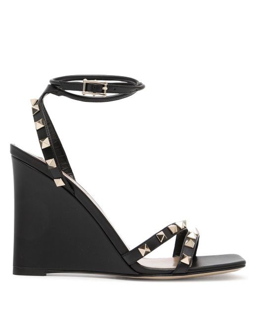 Valentino Garavani Leather Valentino Garavani 110mm Rockstud-embellished  Wedge Sandals in Black - Lyst