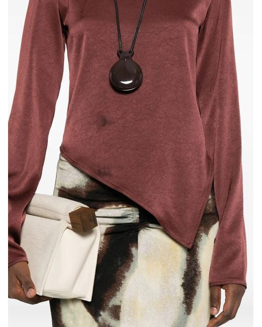 Top con dobladillo asimétrico Nanushka de color Purple