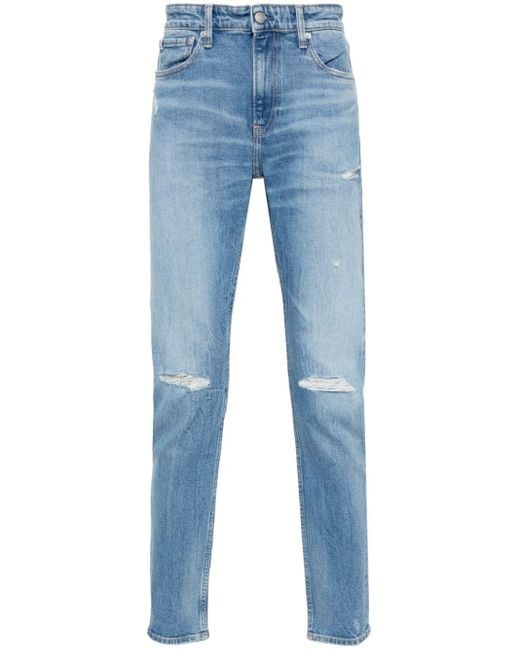 Calvin Klein Blue Distressed Tapered-leg Jeans for men