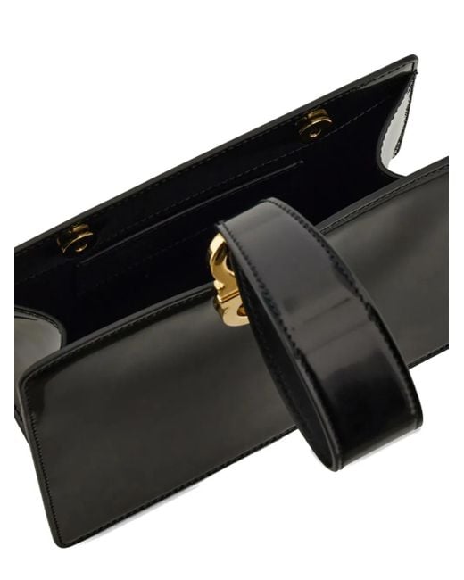 Bolso de mano con motivo geométrico Ferragamo de color Black