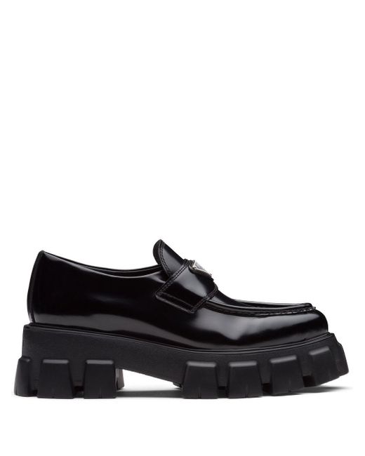 Schoenen voor voor Prada Muiltjes Met Logoplakkaat in het Zwart Dames  Schoenen voor voor Platte schoenen voor Loafers en mocassins allware.com.br