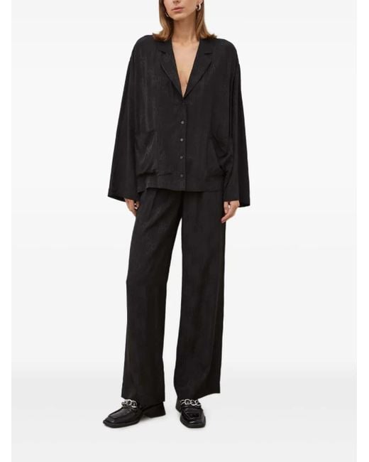 Herskind Black Monogram-Pattern Trousers