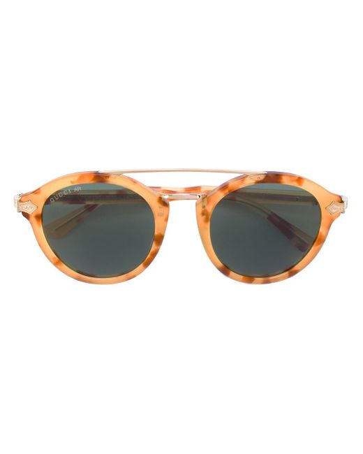 Double bridge round sunglasses Gucci en coloris Brown