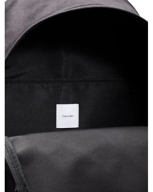 Calvin Klein Blue Logo-Patch Zip-Fastening Backpack for men
