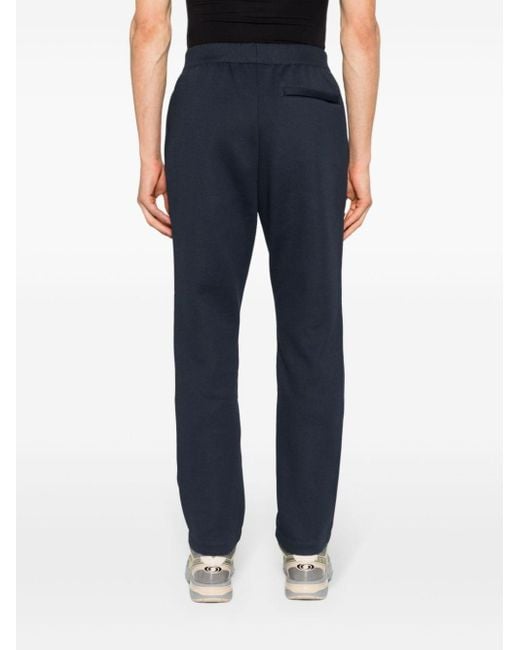 Pantalon de jogging Anglezarke TP Adidas pour homme en coloris Blue
