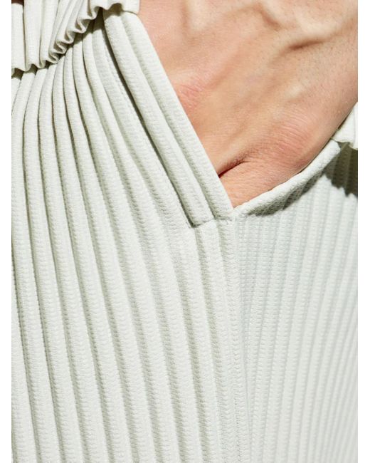 Homme Plissé Issey Miyake White Pleated Trousers for men