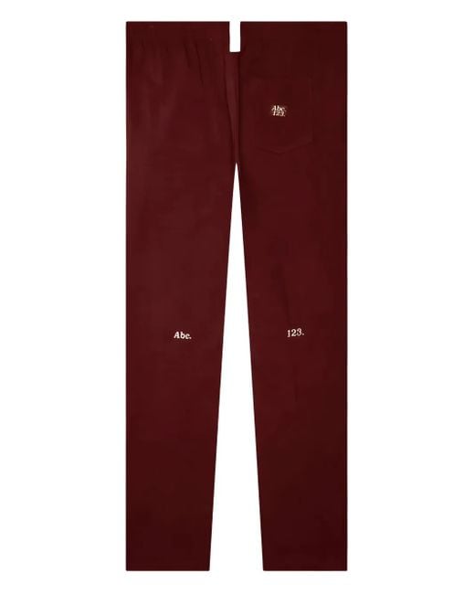 Advisory Board Crystals Red Logo-Patch Trousers for men