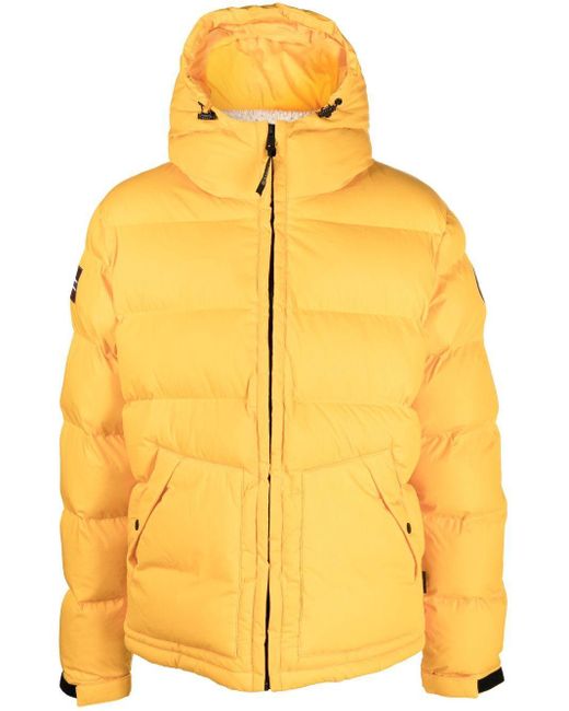 Plumifero amarillo hombre cheap