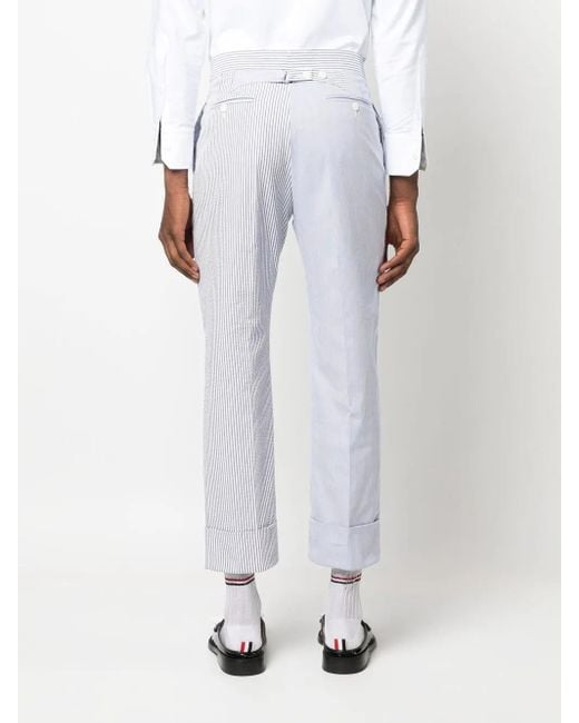 Cropped seersucker trousers Thom Browne de hombre de color Blue