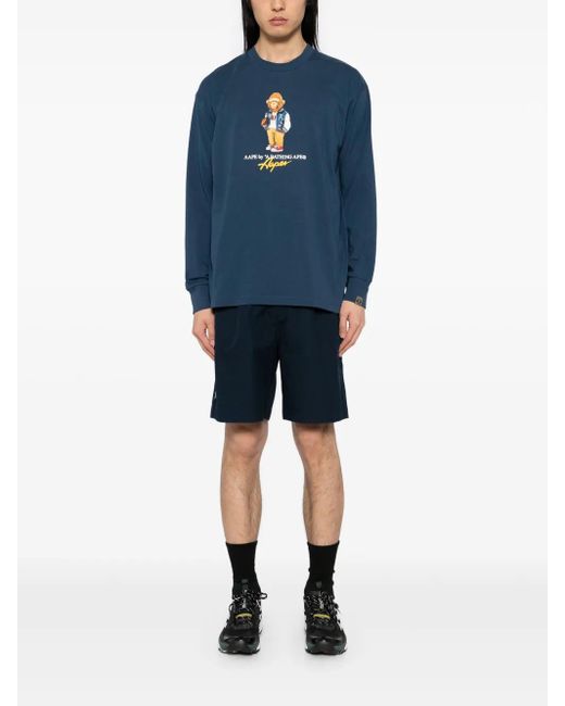 Aape By A Bathing Ape Blue Moonface Logo Shorts for men