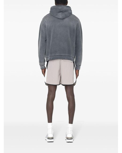 Shorts con design color-block di John Elliott in White da Uomo
