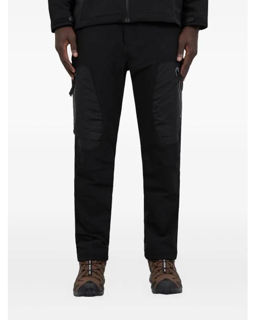 Pantalones con panel de conchas And Wander de hombre de color Black