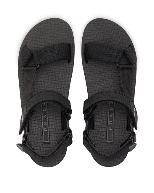 Sandali Nomad con decorazione di Prada in Nero | Lyst