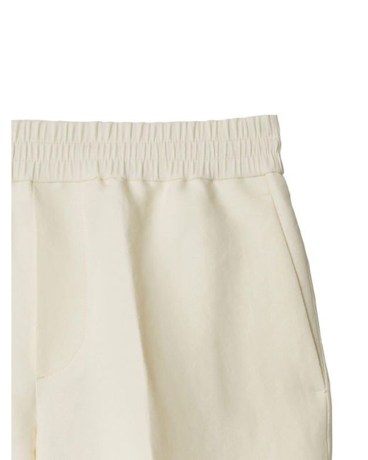 Pantalones ajustados con cinturilla elástica Burberry de color White
