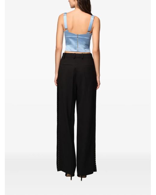 Pantalones con apliques Murmur de color Black