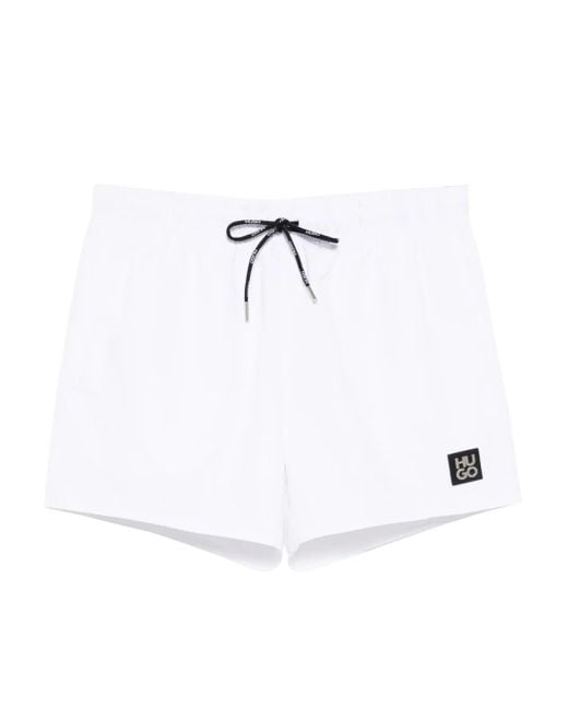 HUGO White Logo-Patched Swim Shorts for men