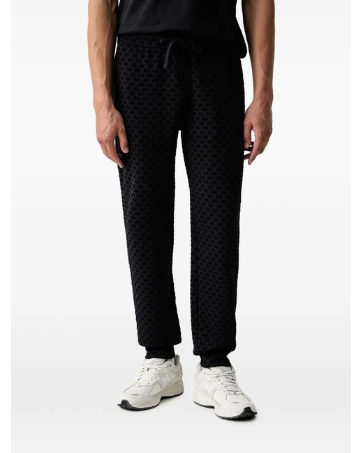 ARMANI EXCHANGE Black Logo-Pattern Track Pants for men