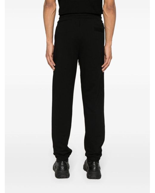Pantaloni sportivi con cuciture in rilievo di Moncler in Black da Uomo