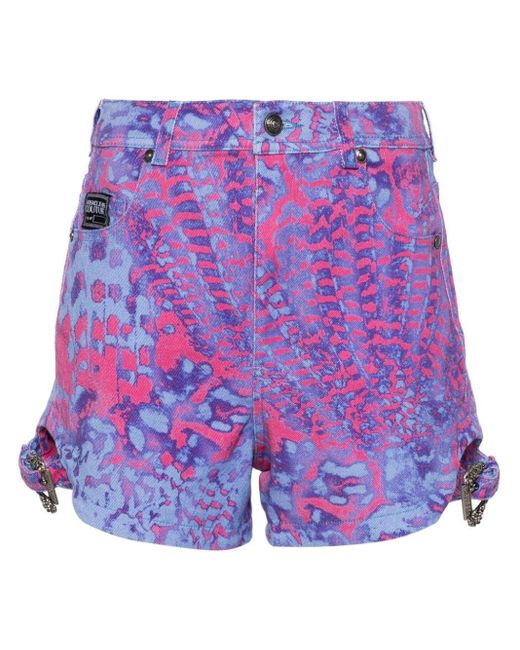 Short Animalier en jean Versace en coloris Purple