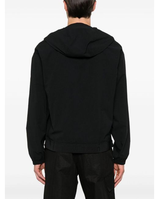 Giacca a vento con cappuccio di Calvin Klein in Black da Uomo