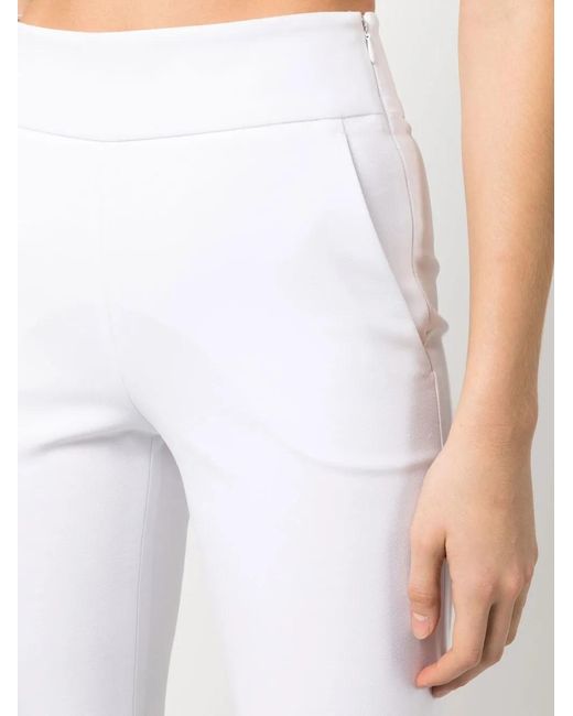 Genny White Zipped Flared Trousers