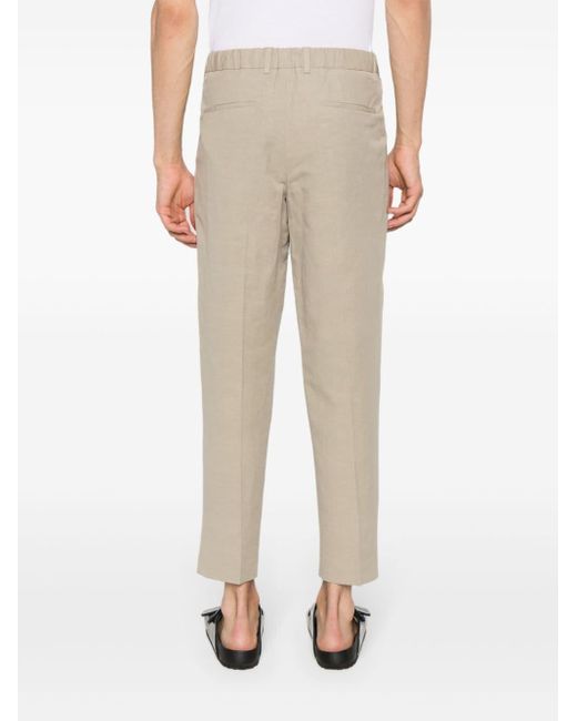 Pantaloni affusolati crop di Calvin Klein in Natural da Uomo
