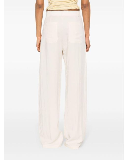 Pantalones anchos con efecto arrugado Blumarine de color White