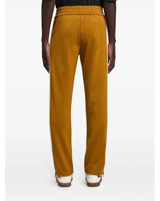 Palm Angels Yellow Side Logo Embroidered Sports Trousers for men