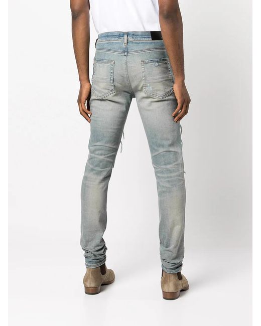 Amiri Blue Distressed Skinny Jeans for men