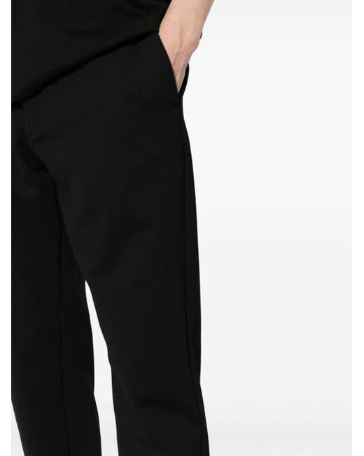 Pantaloni con banda logo di Calvin Klein in Black da Uomo