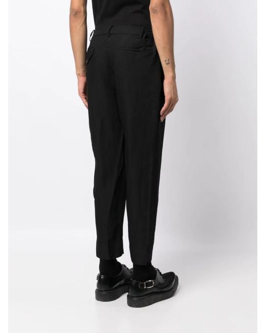 Pantalones ajustados con motivo chevron COMME DES GARÇON BLACK de color Black