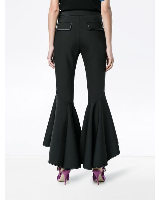 black fitted flared trousers