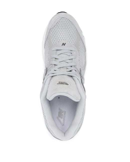 New Balance White M2002W Sneakers