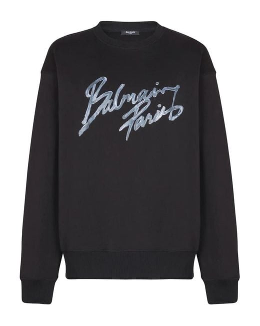 Sudadera de algodón con logo estampado Balmain de hombre de color Black
