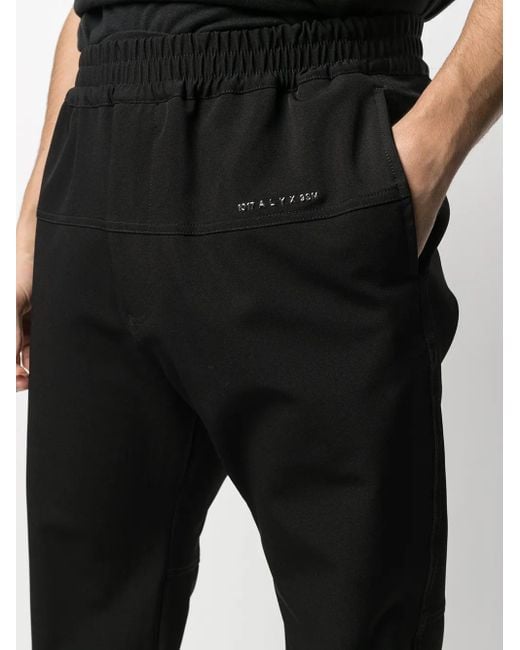 1017 ALYX 9SM Black Stripe Panel Trackpants for men