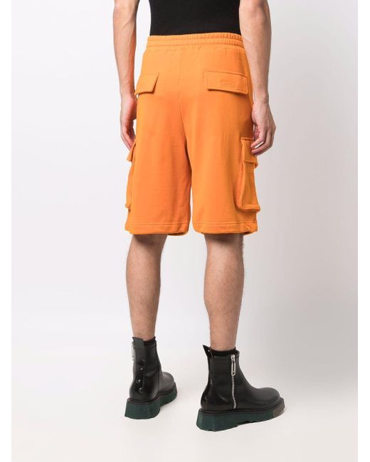 Pantalones cortos estilo cargo con placa del logo Dolce \u0026 Gabbana de  Algodón de color Naranja para hombre - Lyst