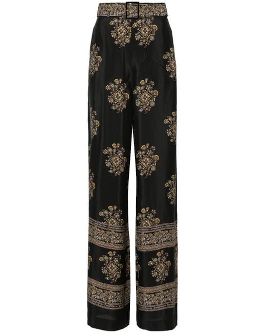 Pantalones palazzo con estampado floral Zimmermann de color Black