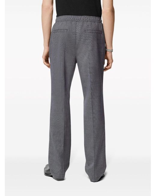 Pantalones ajustados con placa Medusa Versace de hombre de color Gray