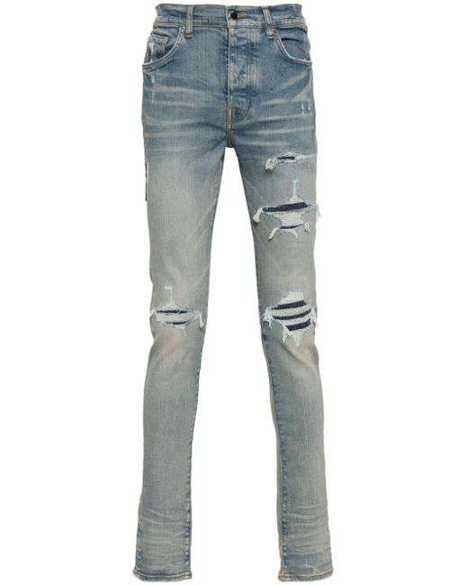 Amiri Blue Logo-Patch Ripped Skinny Jeans for men