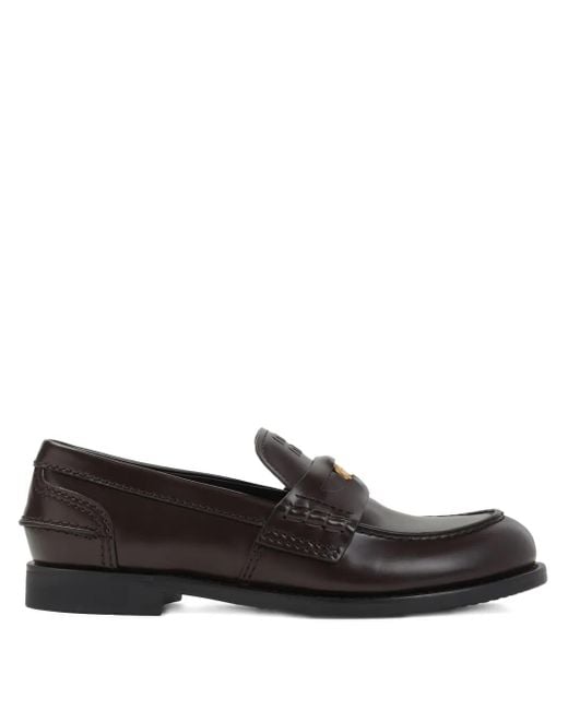 Mocasines penny de piel Miu Miu de color Black