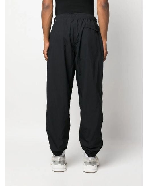 Nike Black Solo Swoosh Track Pants for men