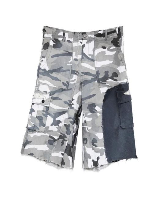 INNOCENCE NYC Blue Camo Asymmetry Studs Shorts for men
