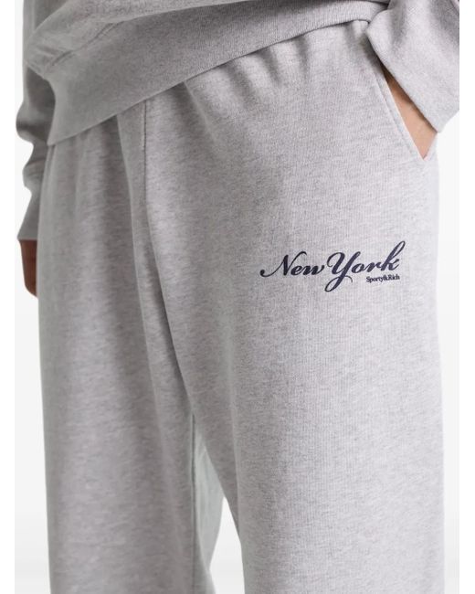 Sporty & Rich White New York Track Pants