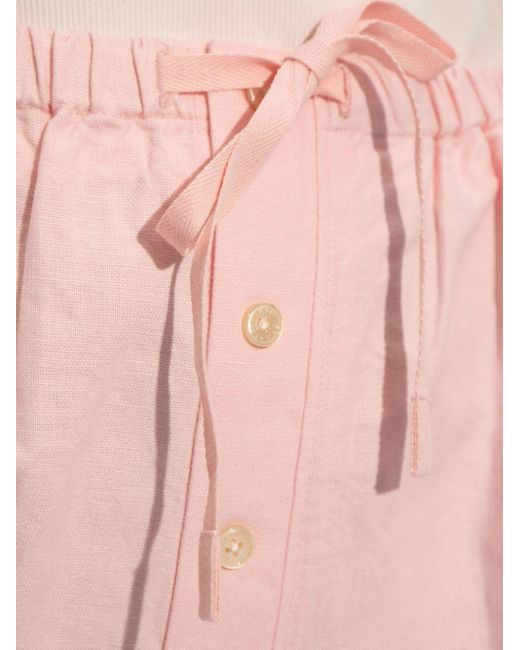 Short à ourlet festonné Victoria Beckham en coloris Pink