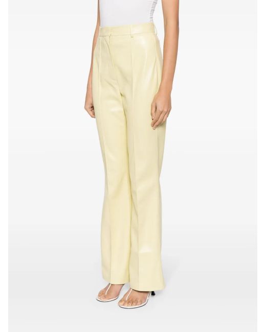 Nanushka Yellow Leena Faux-Leather Flared Trousers