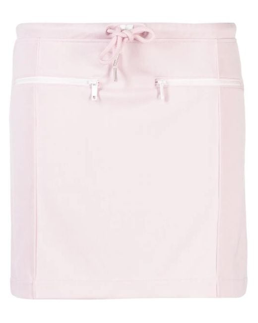 Minijupe À Patch Logo Courreges en coloris Pink