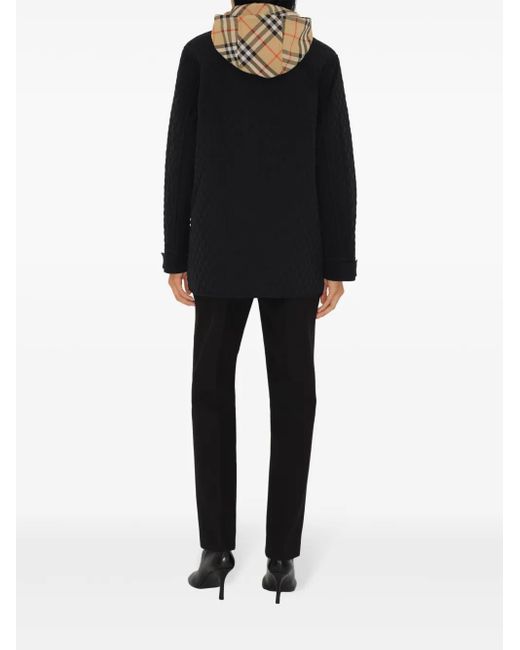 Plumífero con capucha Burberry de color Black