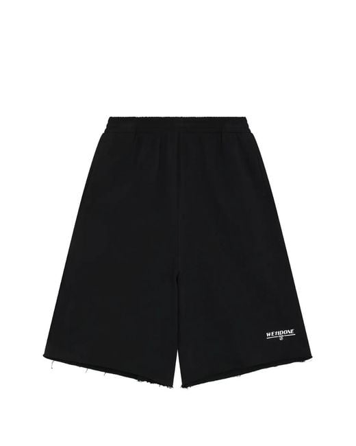 we11done Black Logo-Print Raw-Edge Shorts