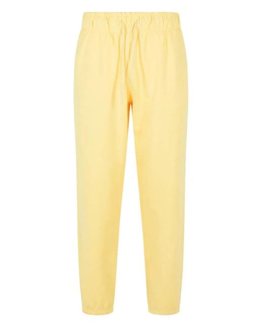 メンズ New Balance ロゴパッチ トラックパンツ Yellow